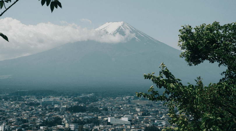 Mount Fuji over a city